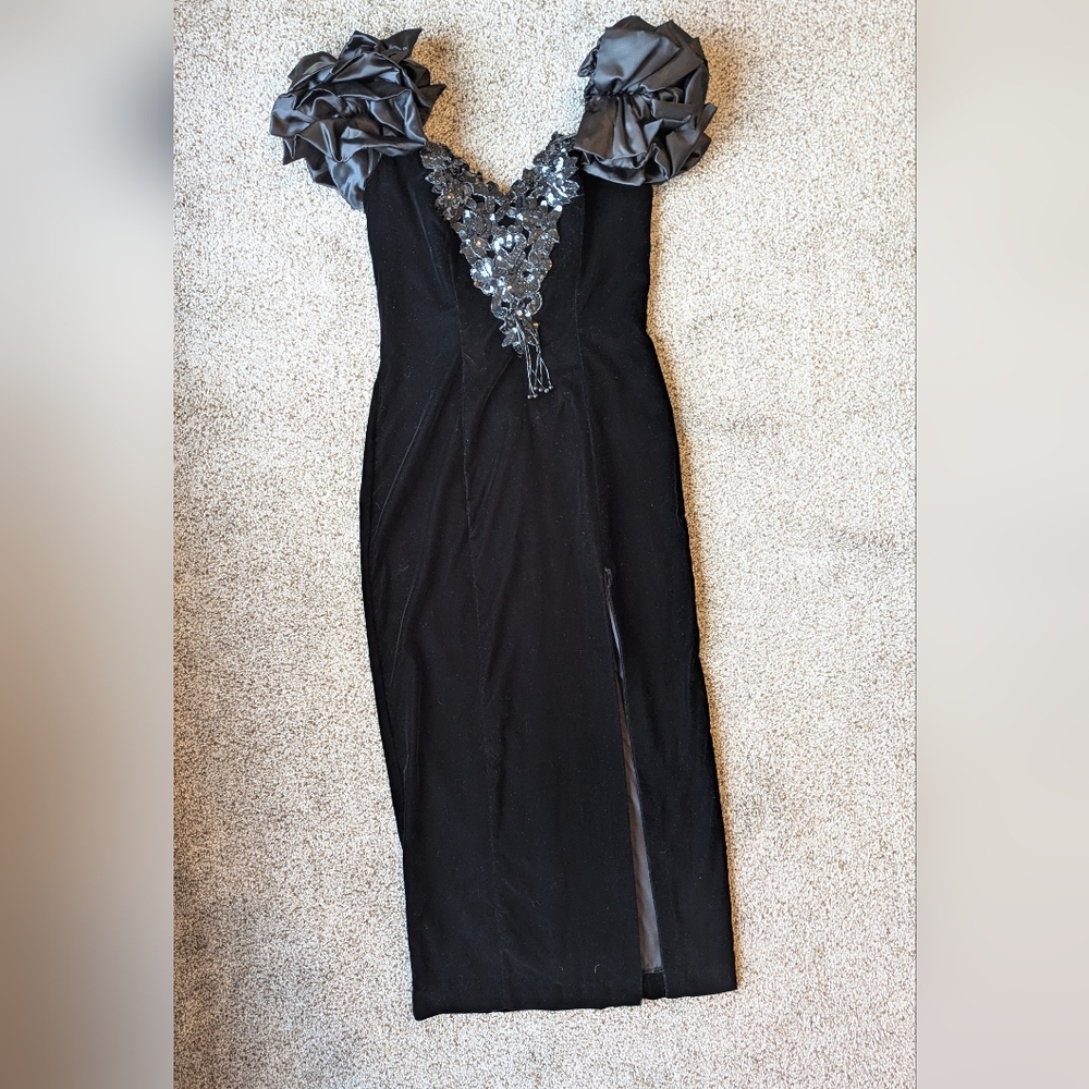 Zum Zum by Niki Livas Black V‑Neck Evening Gown with Satin Rosette Shoulders